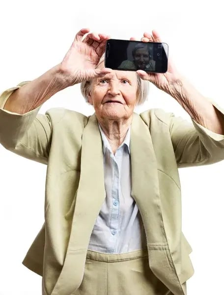 depositphotos_63711521-stock-photo-happy-elderly-woman-using-touch